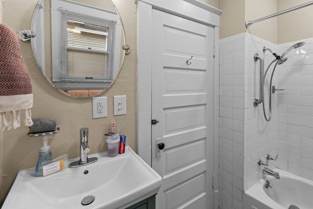 cairo st bungalow bathroom vanity shower white subway tile